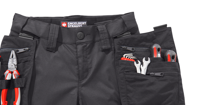 Sacoche à outils e.s.concrete fixée sur le pantalon à taille élastique e.s.concrete